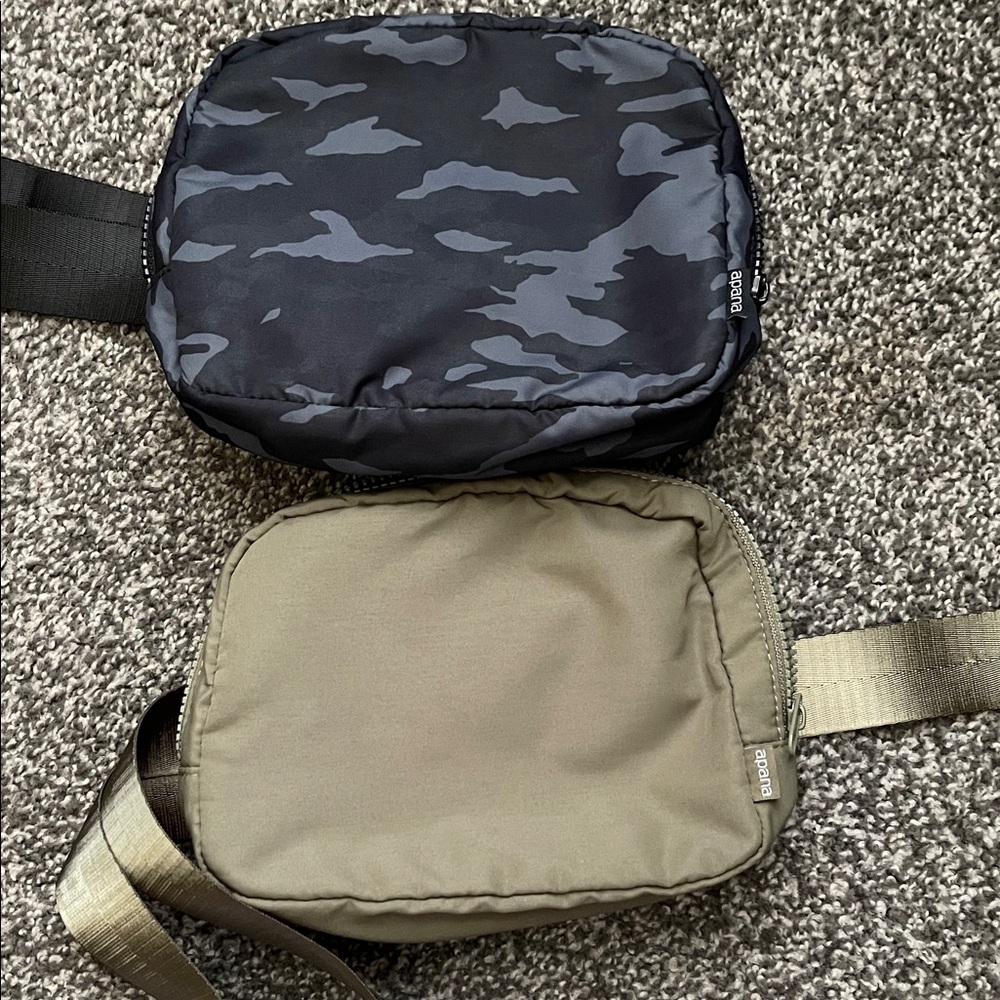2 Women Black and Tan Crossbody Bags. Worn once each